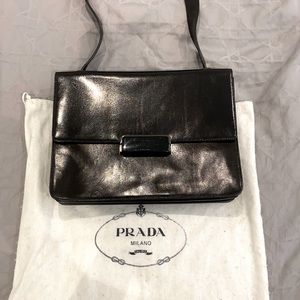 Never worn black Prada shoulder bag. New with original tags and dust bag.